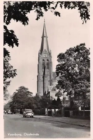 Kup teraz Voorburg Oosteinde met Sint-Martinus kerk en auto 1955 's-Gravenhage HC49737